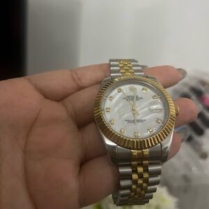 R silver and gold mother of pearl dial shell watch